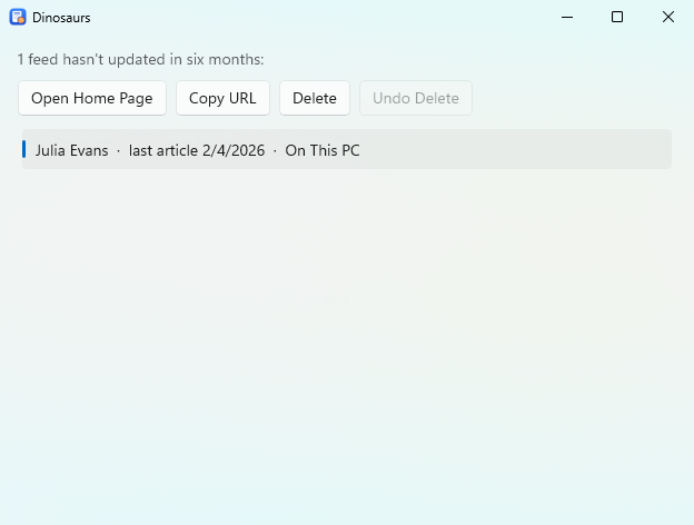 The Dinosaurs window, listing one feed, Julia Evans, whose last article was in February, with buttons to open its home page, copy its URL or delete it.